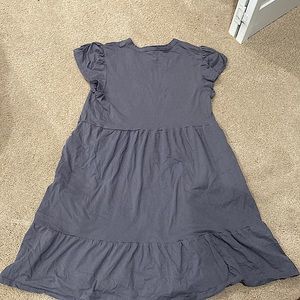 This Dress has only one layer has a flow fringe at the bottom of the dress